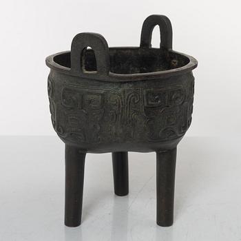 A Chinese tripod bronze censer, Ming style, Qing dynasty (1644-1912).