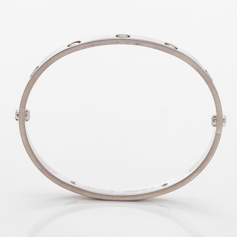 Cartier, rannekoru "Love", 18K valkokultaa, briljanttihiottuja timantteja.