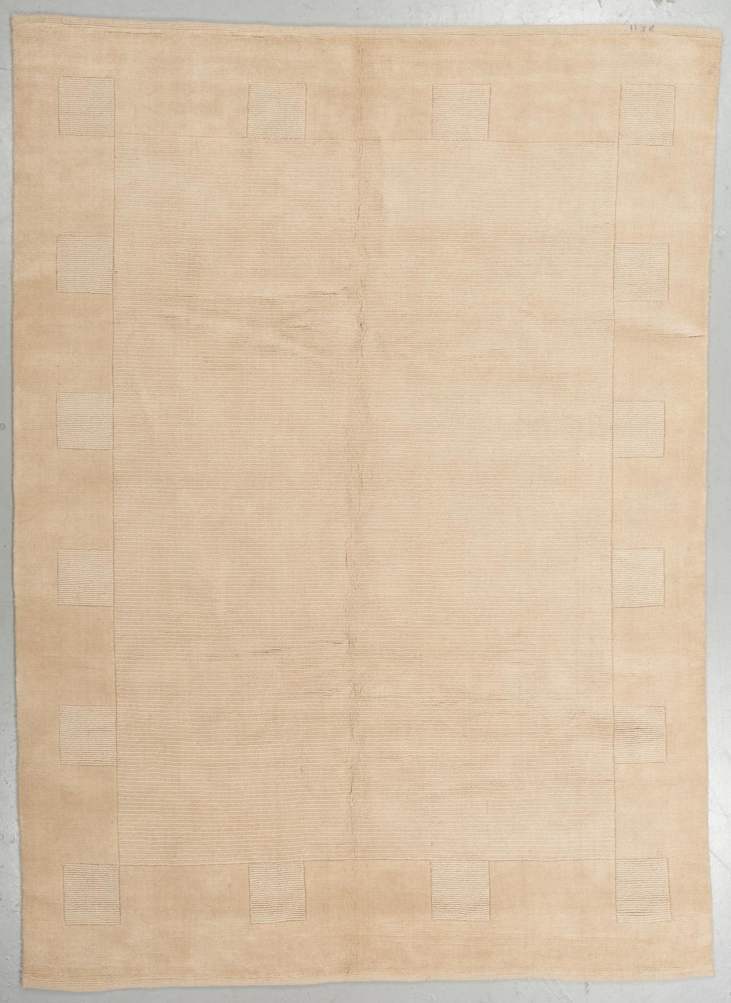 A CARPET, loomed, India, ca 275 x 200 cm.