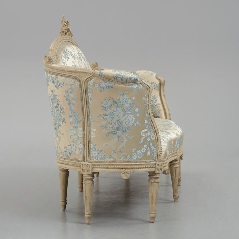 A grey-painted Gustavian 'canapé en corbeille'. sofa, by J E Höglander.