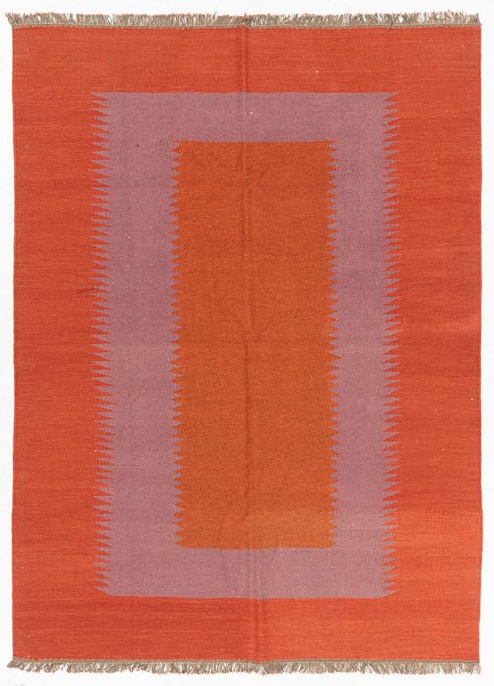 A persian kilim rug, approximately 243 x 179 cm.