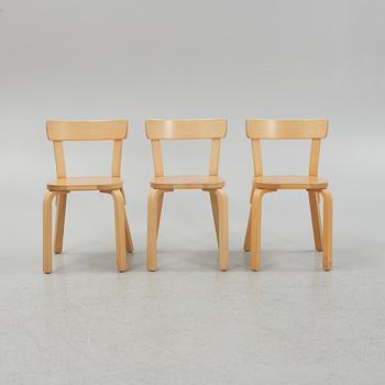 Alvar Aalto, a set of three model 69 chairs, Artek, Finland.