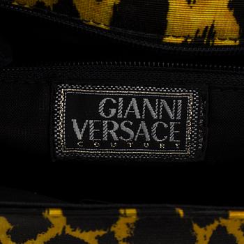 Leopard printed handbag by Gianni Versace.
