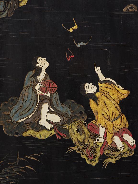 A Chinese four panel lacquer folding screen, first part of the 20th century.