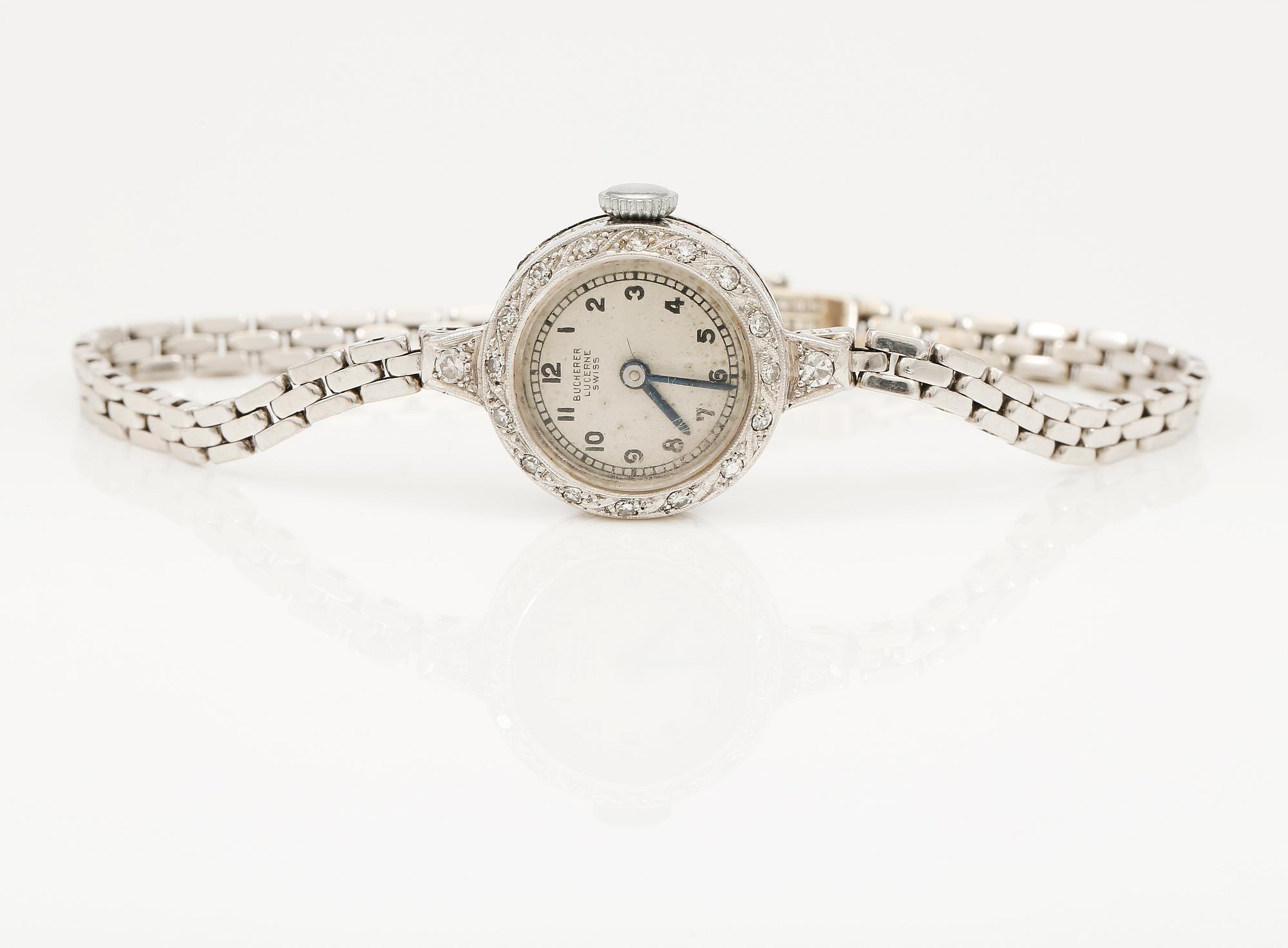 ARMBANDSUR, platina, Bucherer, Lucerne, Swiss, med ARMBAND, 18K vitguld, 1949. Totalvikt med urverk ca 15 gram.