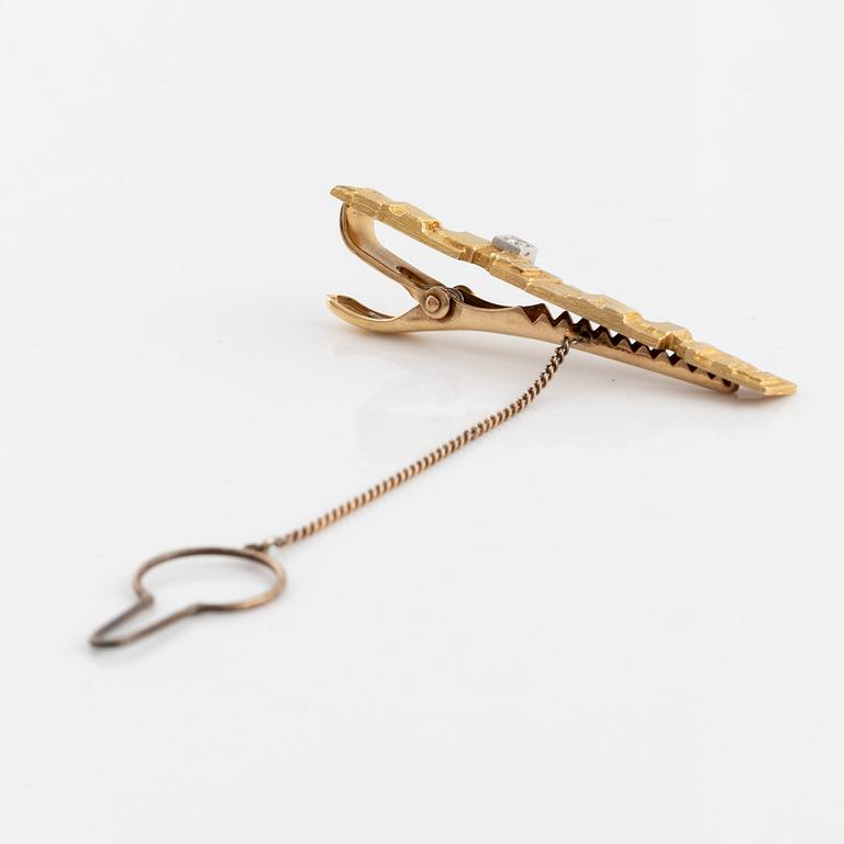 Björn Weckström, 18K gold and brilliant cut dimond tie pin. Lapponia 1989.
