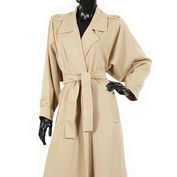YVES SAINT LAURENT, a beige wool coat.