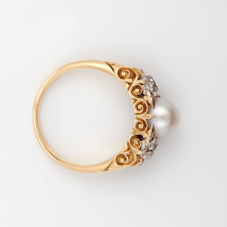 An old- and rose-cut diamond and natural saltwater pearl ring.