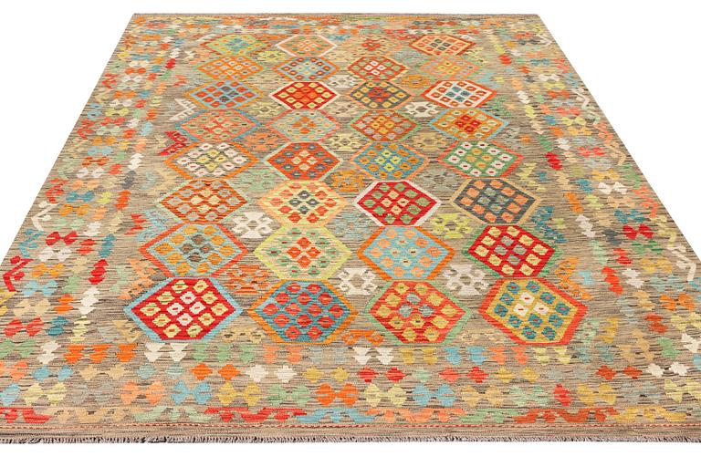 A Kilim carpet, c. 377 x 278 cm.