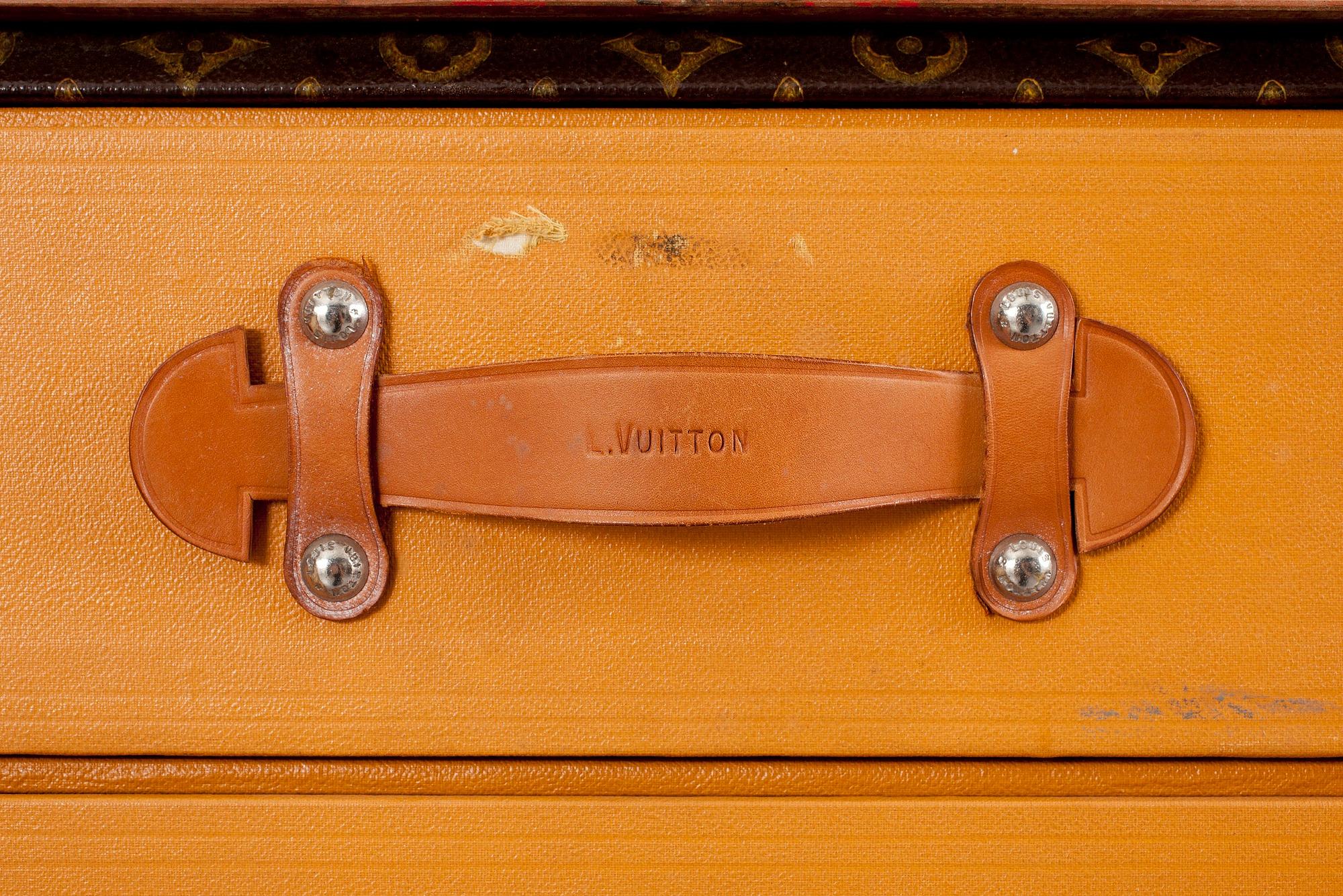 An early 20th cent monogram canvas trunk by Louis Vuitton.