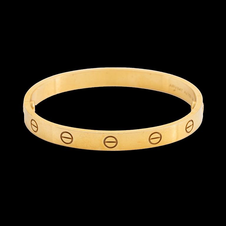 An 18K gold "Love" bracelet by Cartier.