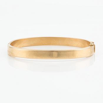 Bangle 18K gold.