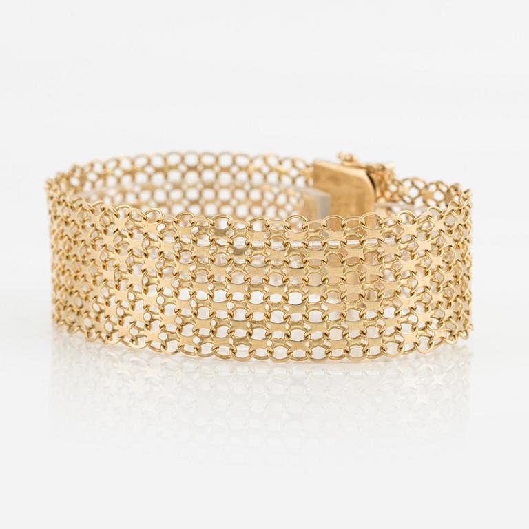 Armlänk, 18K guld, x-länk.