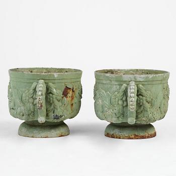 A pair of Swedish cast-iron garden urns, presumably later part 19th century.