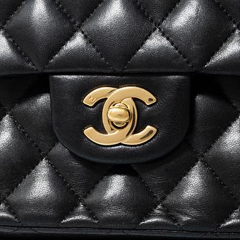 Chanel, A black leather 'Double Flap Bag Small'.