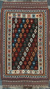 An oriental carpet, Kelim. Circa 270x156 cm.