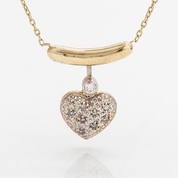 A 14K gold necklace with diamonds ca. 0.08 ct in total.
