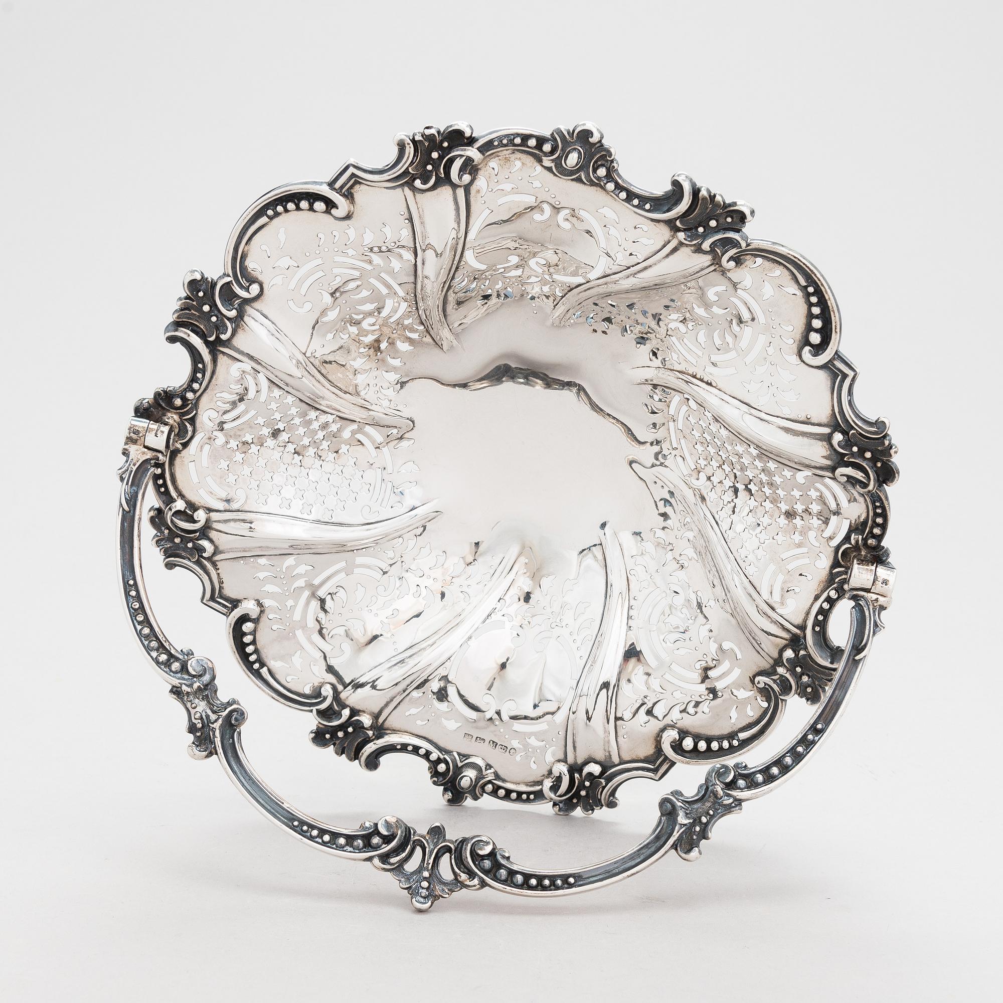 A Victorian sterling silver sweetmeat basket, maker's mark of Henry Wilkinson & Co, Sheffield 1855.