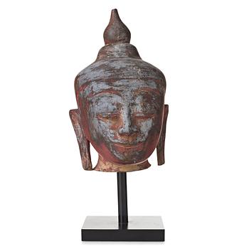 108. A wooden scultpure of Buddhas head, Thailand/Burma, 20th Century.