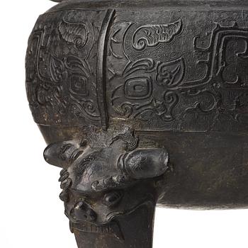 A large bronze censer with cover, presumably late Ming dynasty (1368-1644).