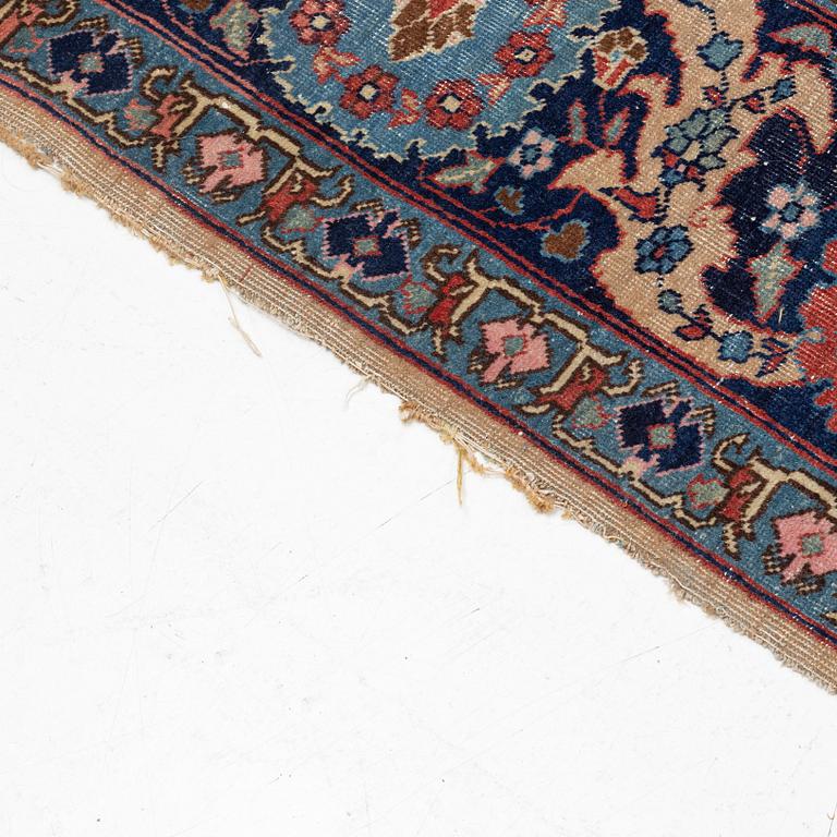 An oriental carpet, circa 350 x 295 cm.