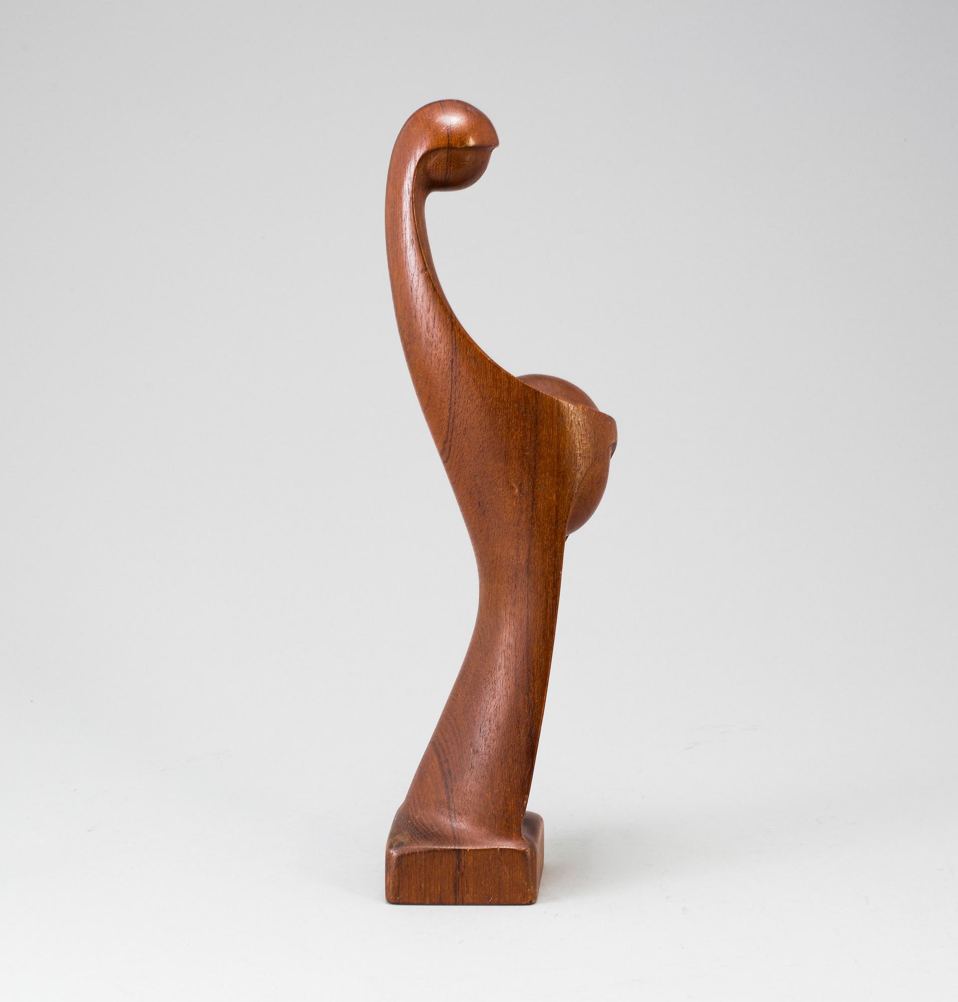 a Danish teak sculpture by Simon Randers.