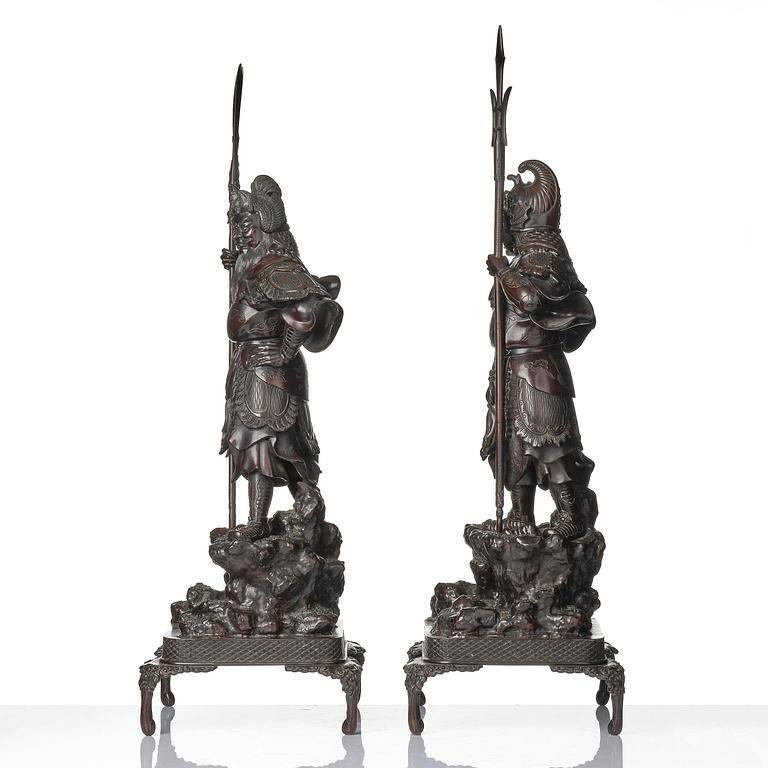 A pair of Japanese bronze guardians, Meiji period (1868-1912).