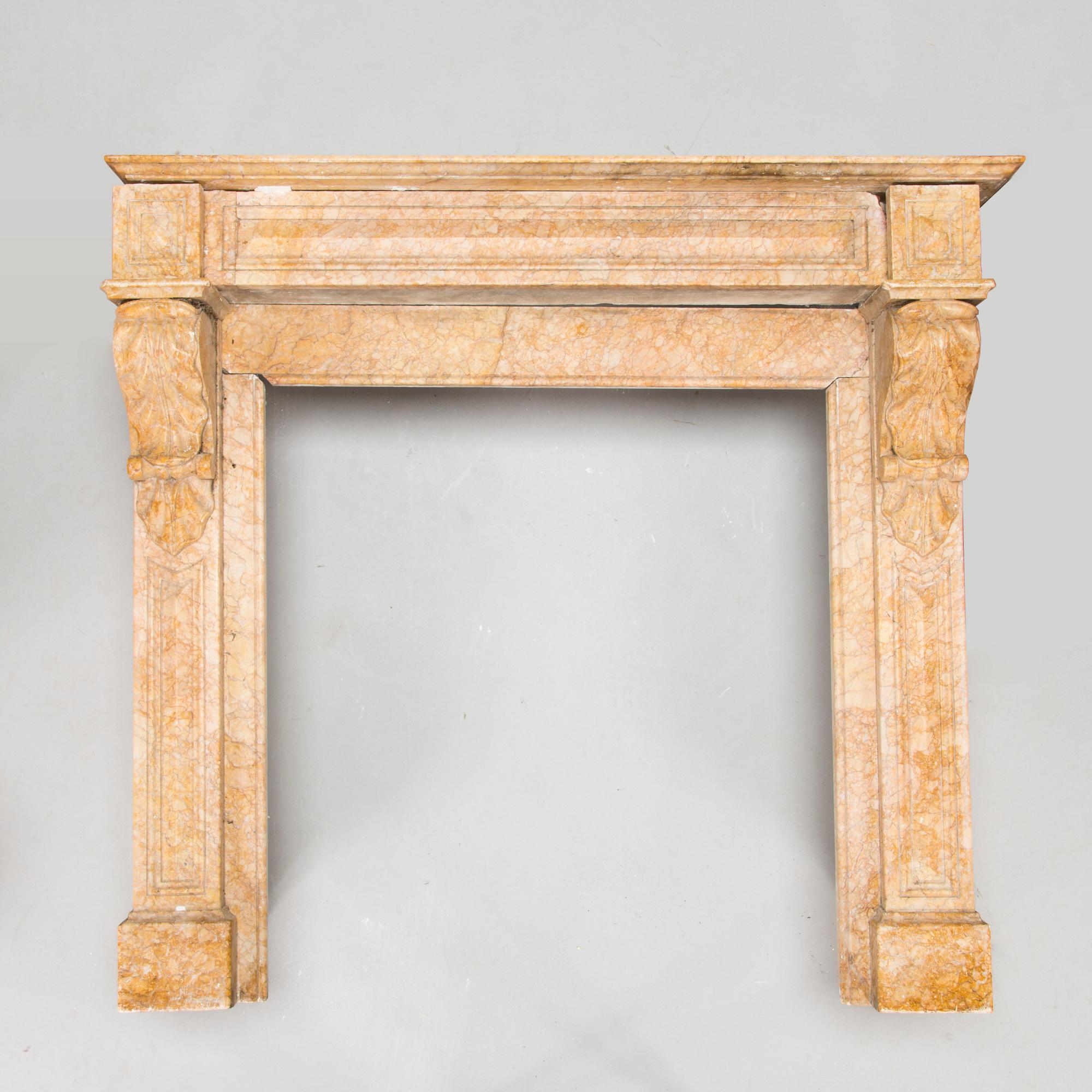 A French marble fireplace mantel, circa 1900.