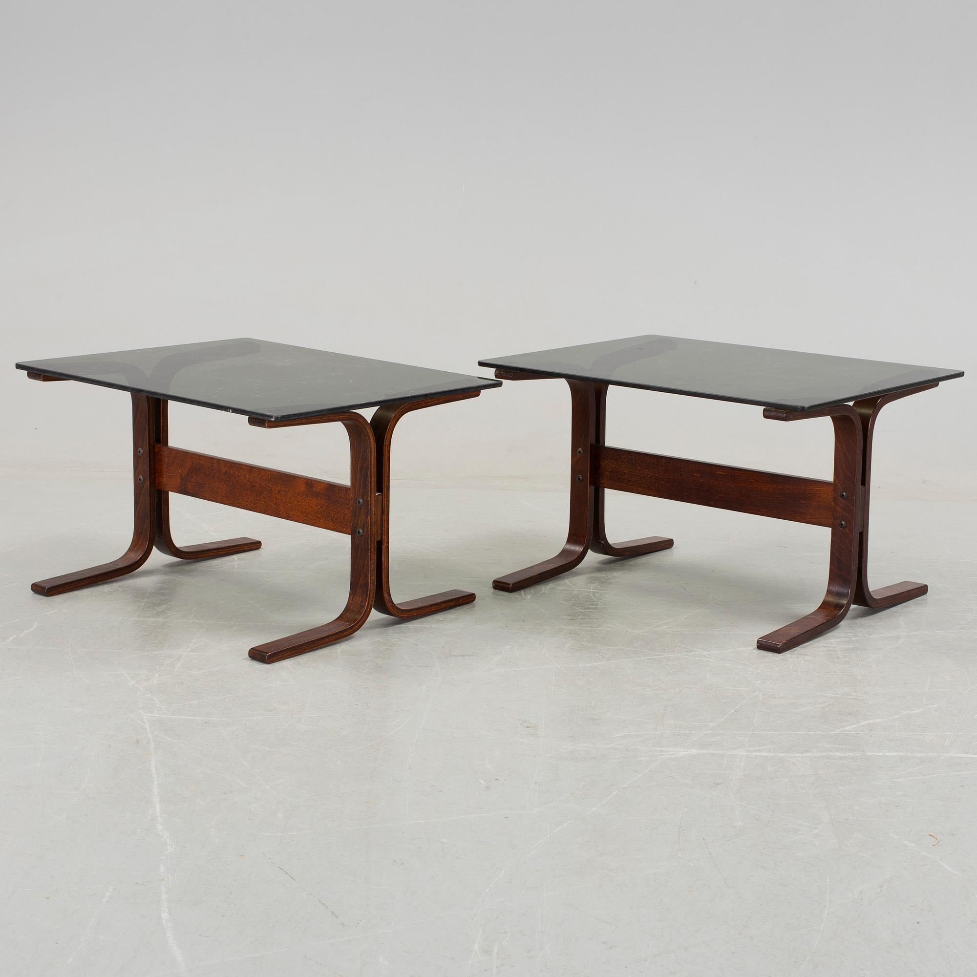 A pair of 1970s "Siesta", easy chairs and sofa tables by Ingmar Relling, Norge.