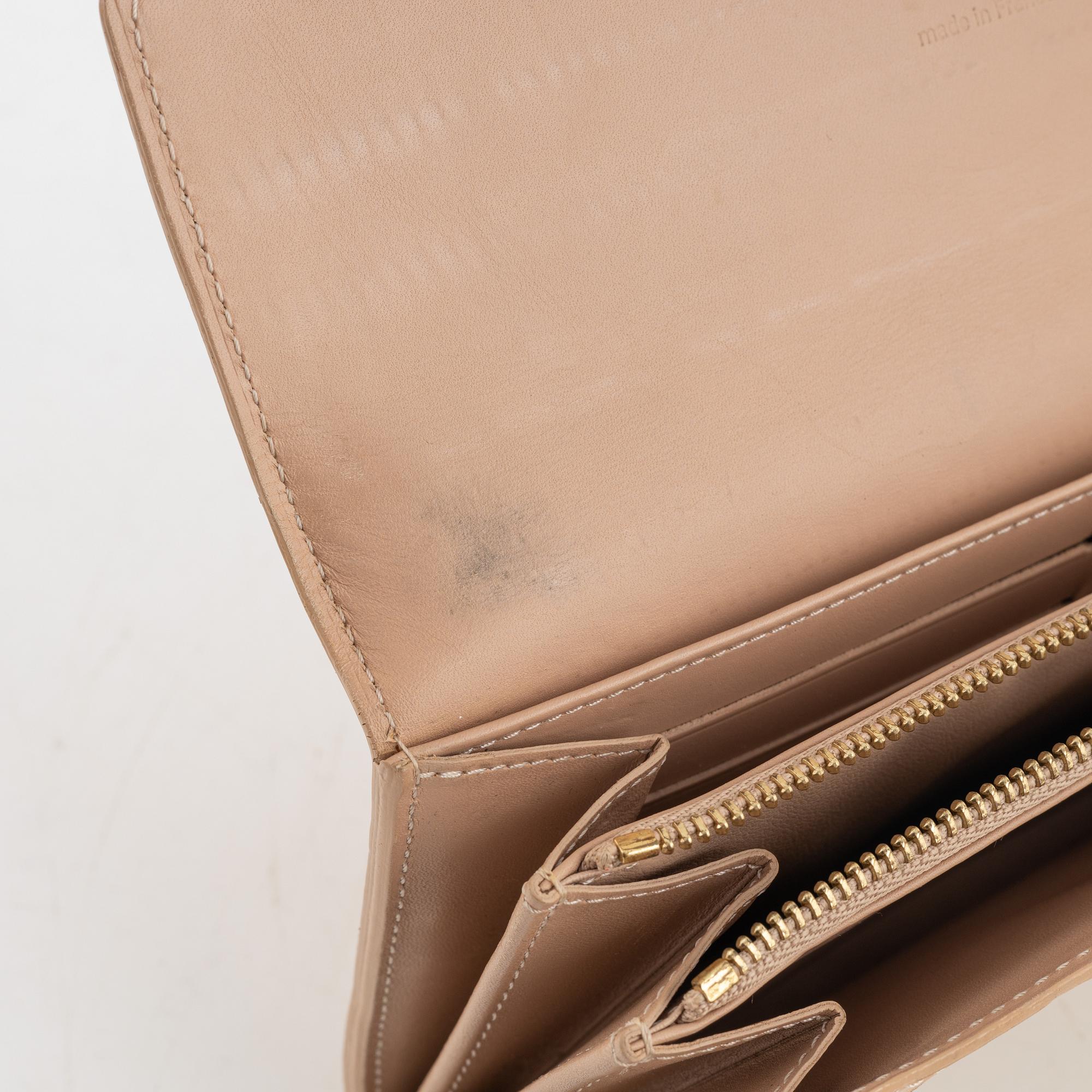 Louis Vuitton, a 'Sarah' vernis wallet.