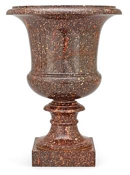 724. A Swedish first half 19th century porphyry urn.