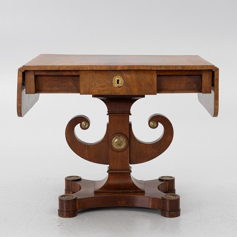 An Empire table, first half of the 19th century.