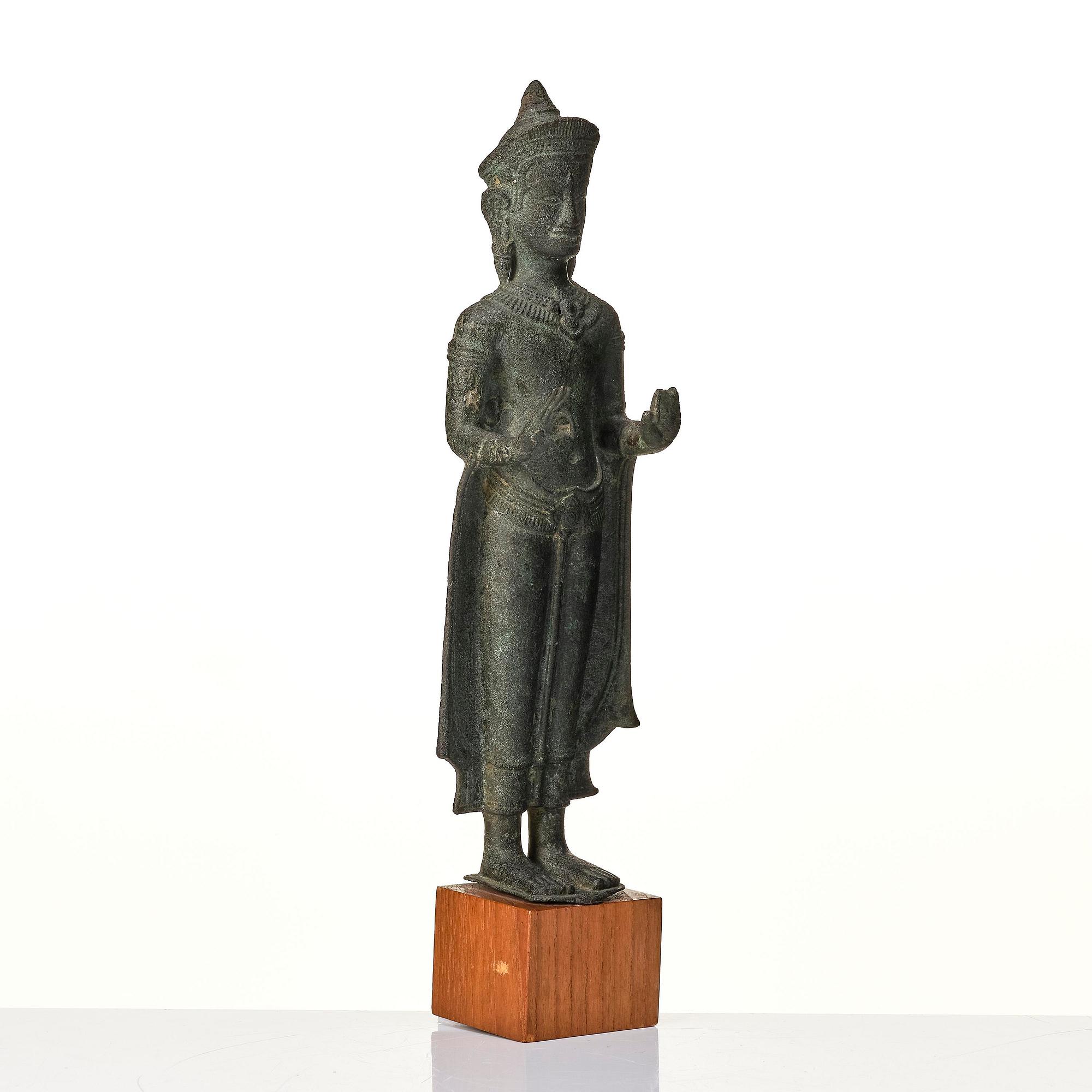 A bronze sculpture of Buddha Shakyamuni, Cambodia, Lopburi, 13th century.