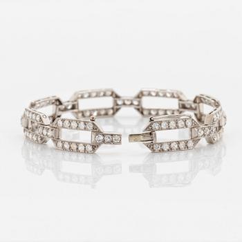 A platinum bracelet set with old-cut diamonds.