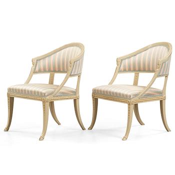 61. A pair of late Gustavian armchairs by Ephraim Ståhl (master in Stockholm 1794-1820).