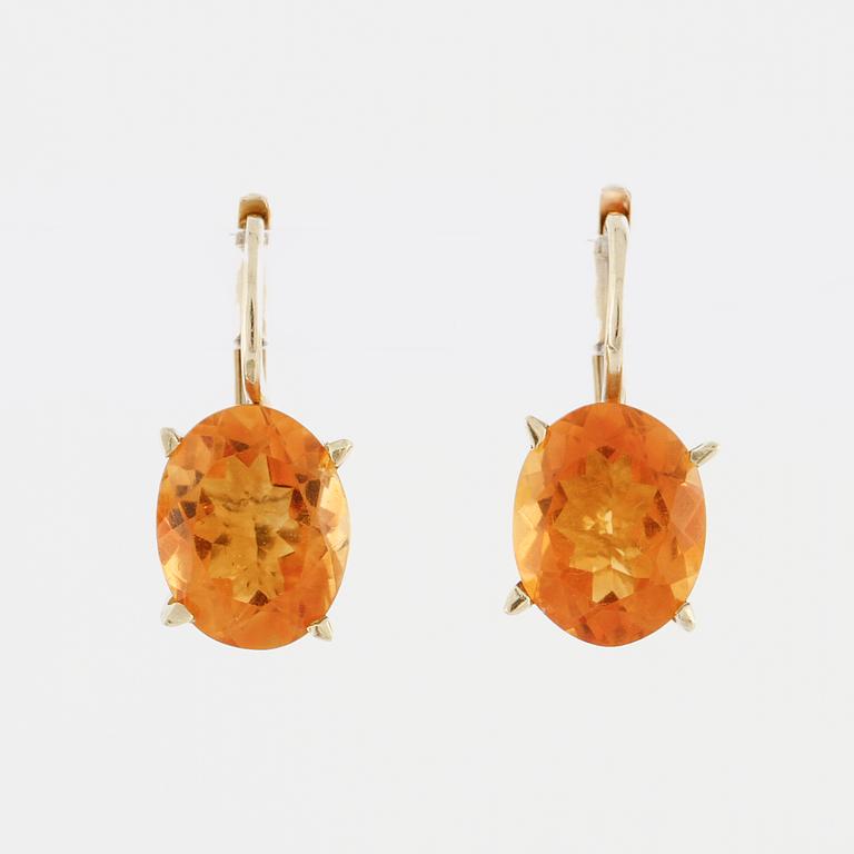 A pair of citrine earrings.