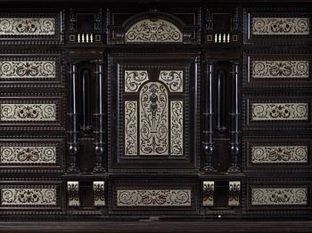 A Baroque-style circa 1900 cabinet on stand.