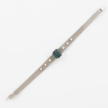 Armband 18K vitguld med en fasettslipad turmalin och runda briljantslipade diamanter.