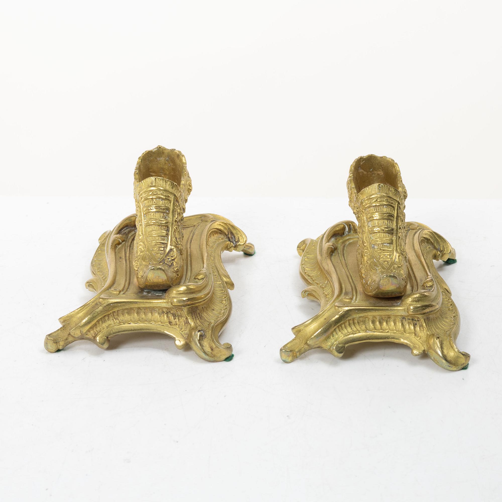 Table ornaments in the form of shoes, a pair, fire-gilt bronze, probably France, 19th century.