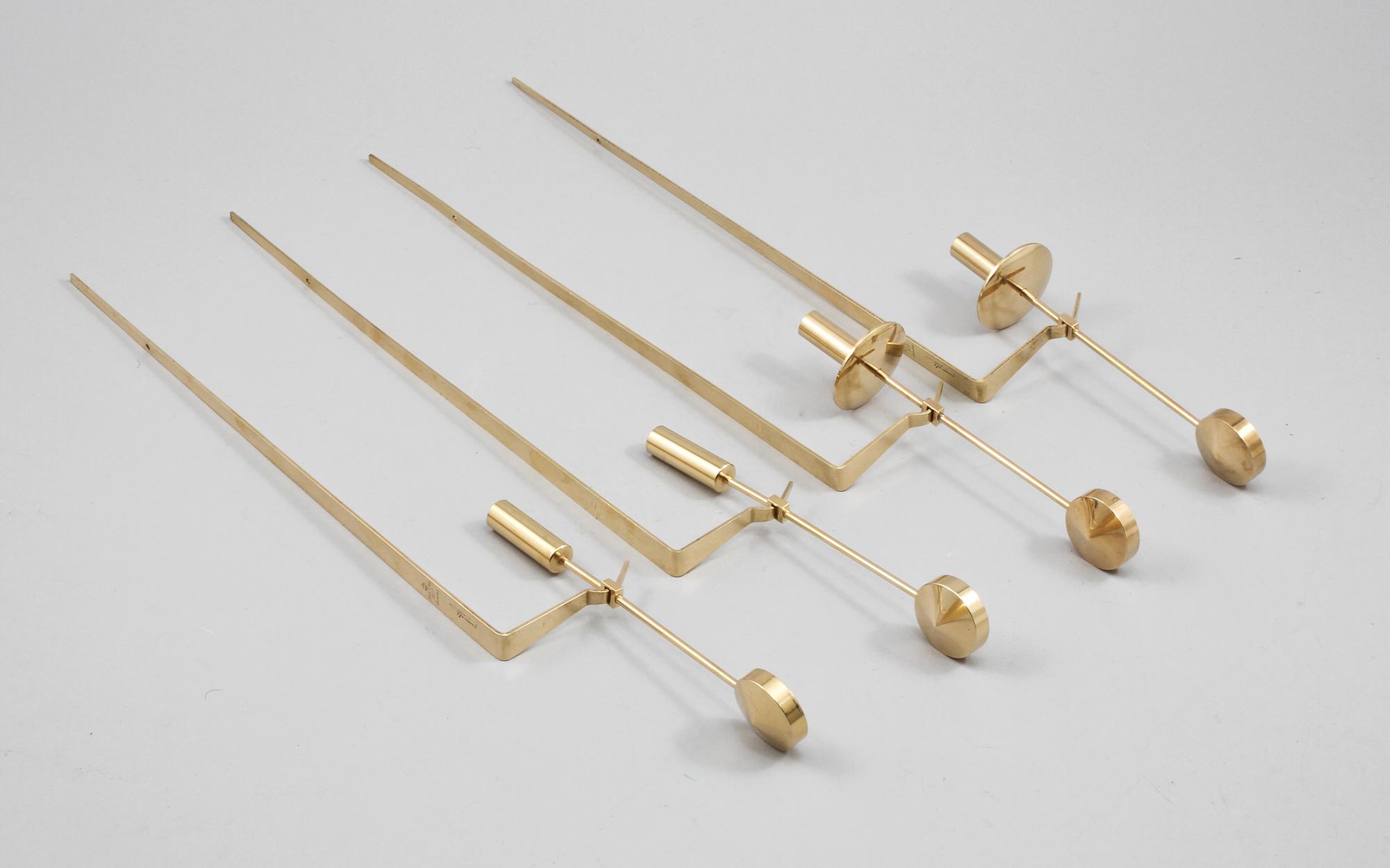 VÄGGLJUSSTAKAR, två par, mässing, "Pendel", Pierre Forsell, Skultuna, 1900-talets andra hälft.