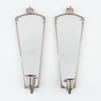 A pair of pewter sconces, 1920's/30's.