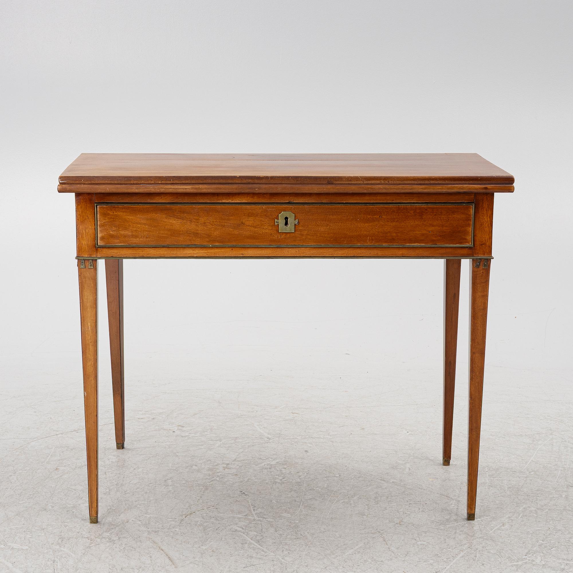 A late Gustavian mahogany cards table, Stockholm, late 18th century.