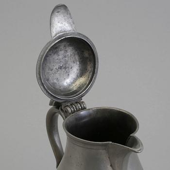 A 18th century tin pot.