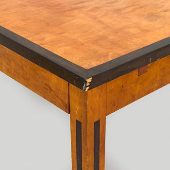 A 1920s/30s century dining table and set of 6 + 2 chairs.