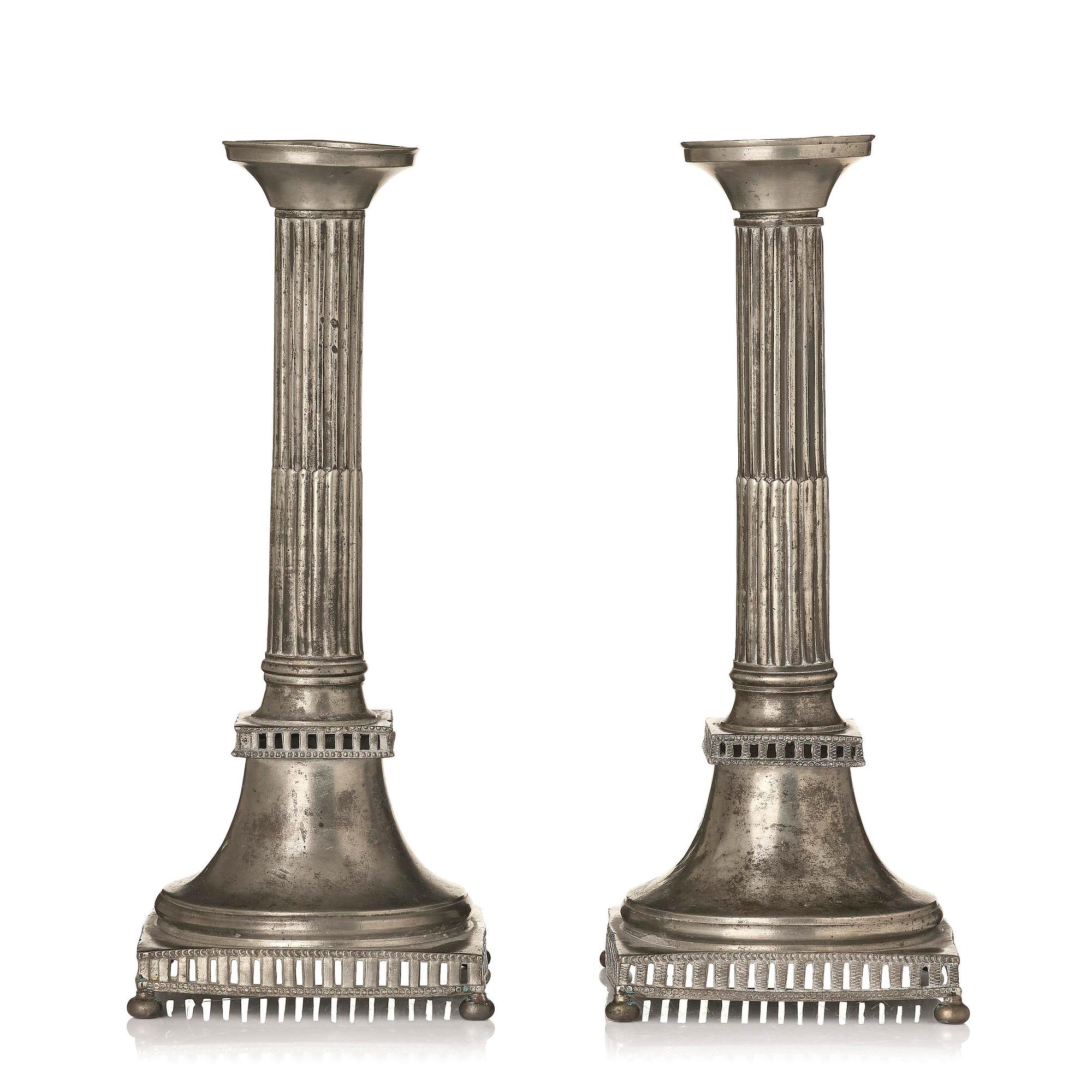 A pair of late Gustyavian pewter candelsticks by N. Justelius, Eksjö  1784-1829.