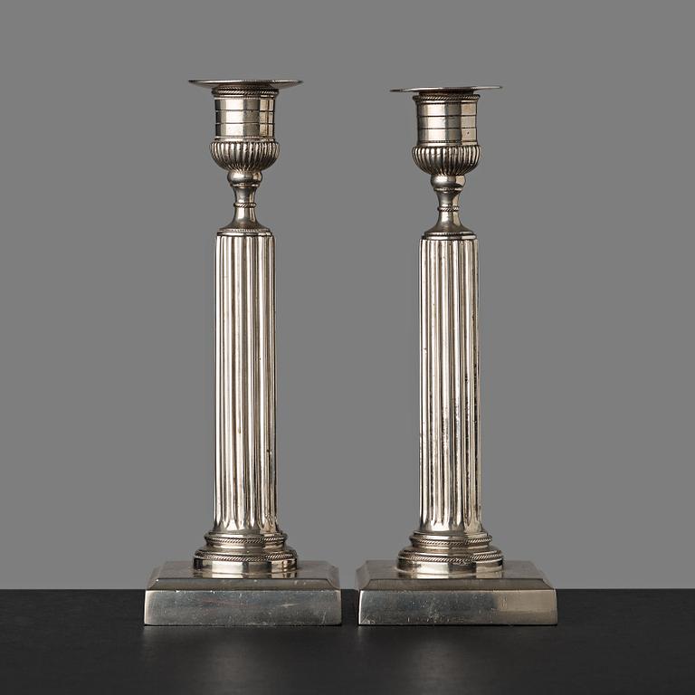 A pair of Gustavian white metal candlesticks by Isak Gråsten (1770-1821), Wedevågs Bruk.