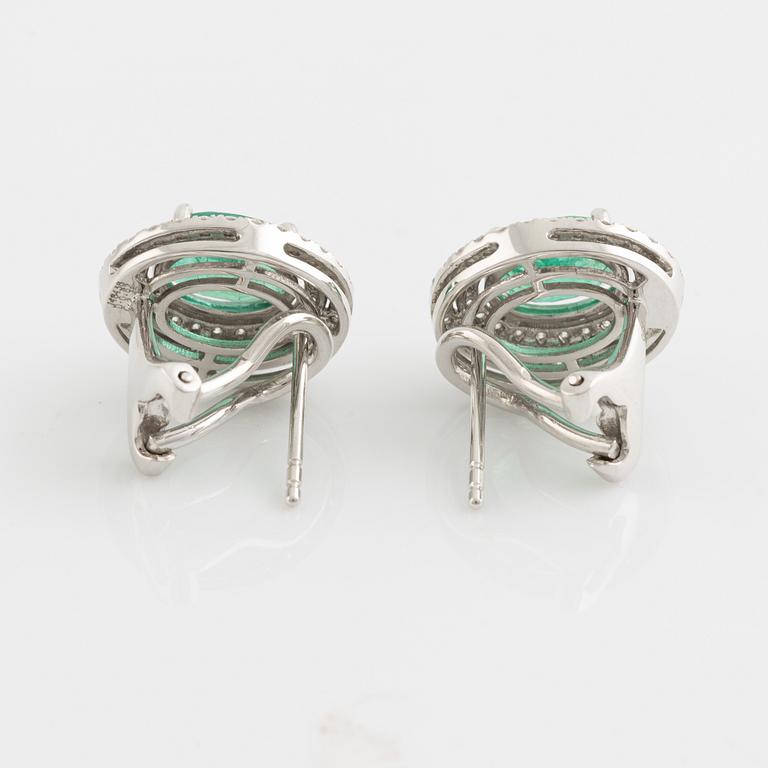 Emerald and brilliant cut diamond earrings.