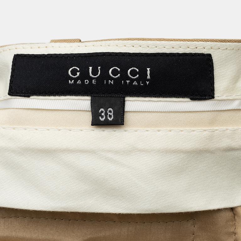 Gucci, byxor, storlek 38.