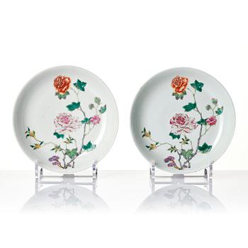A set of four famille rose floral dishes, Qing dynasty with a apocryphal six character mark.
