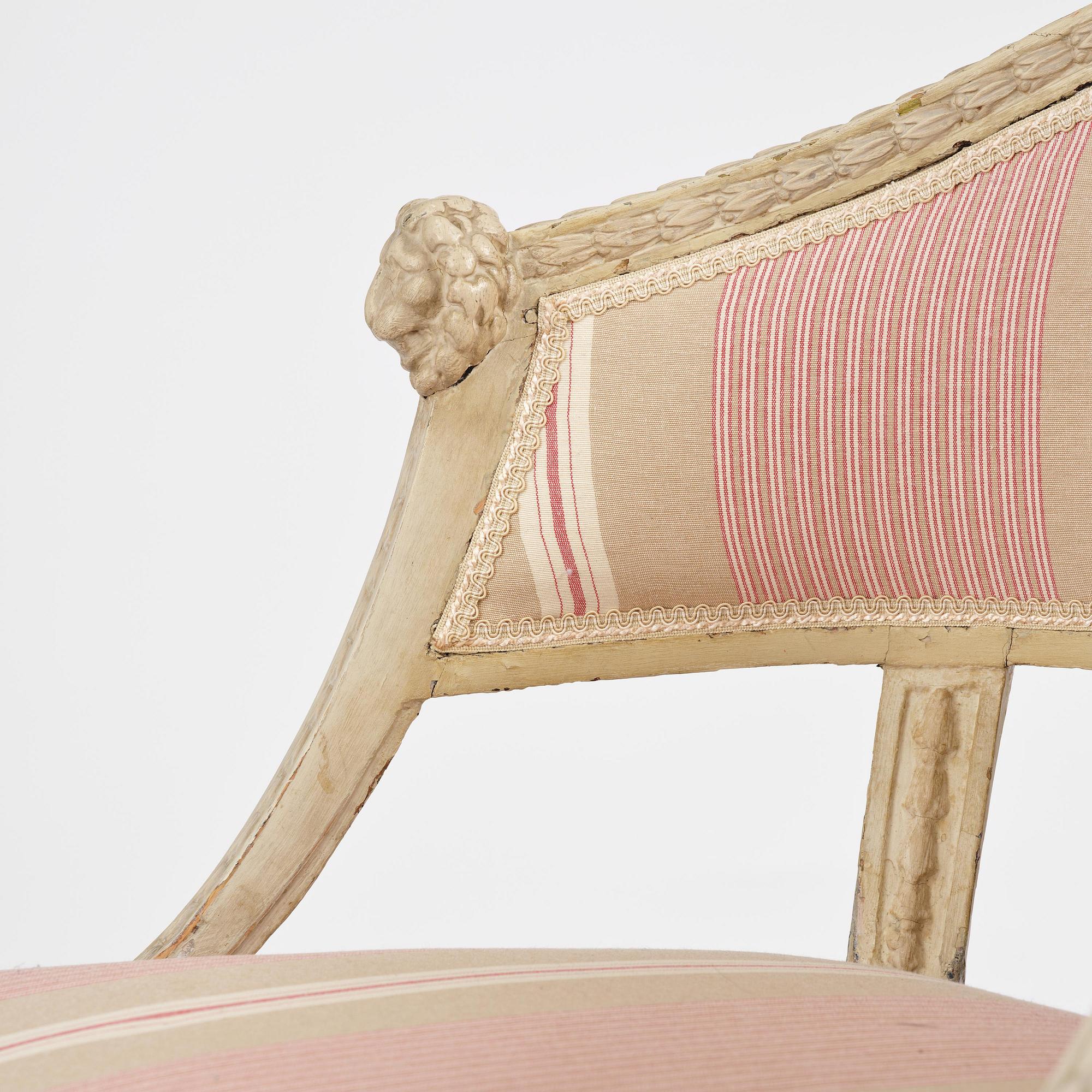 A pair of late Gustavian open.back armchairs, Stockholm, late 18th century.
